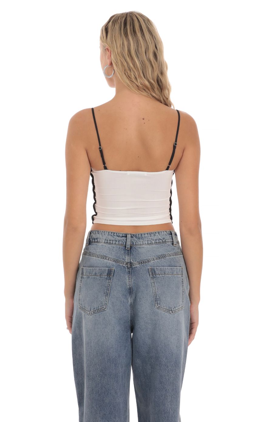 Picture Outline Crop Top in White. Source: https://media-img.lucyinthesky.com/data/Mar24/850xAUTO/76b2149e-0137-4c22-84d6-f56c50f3ad28.jpg