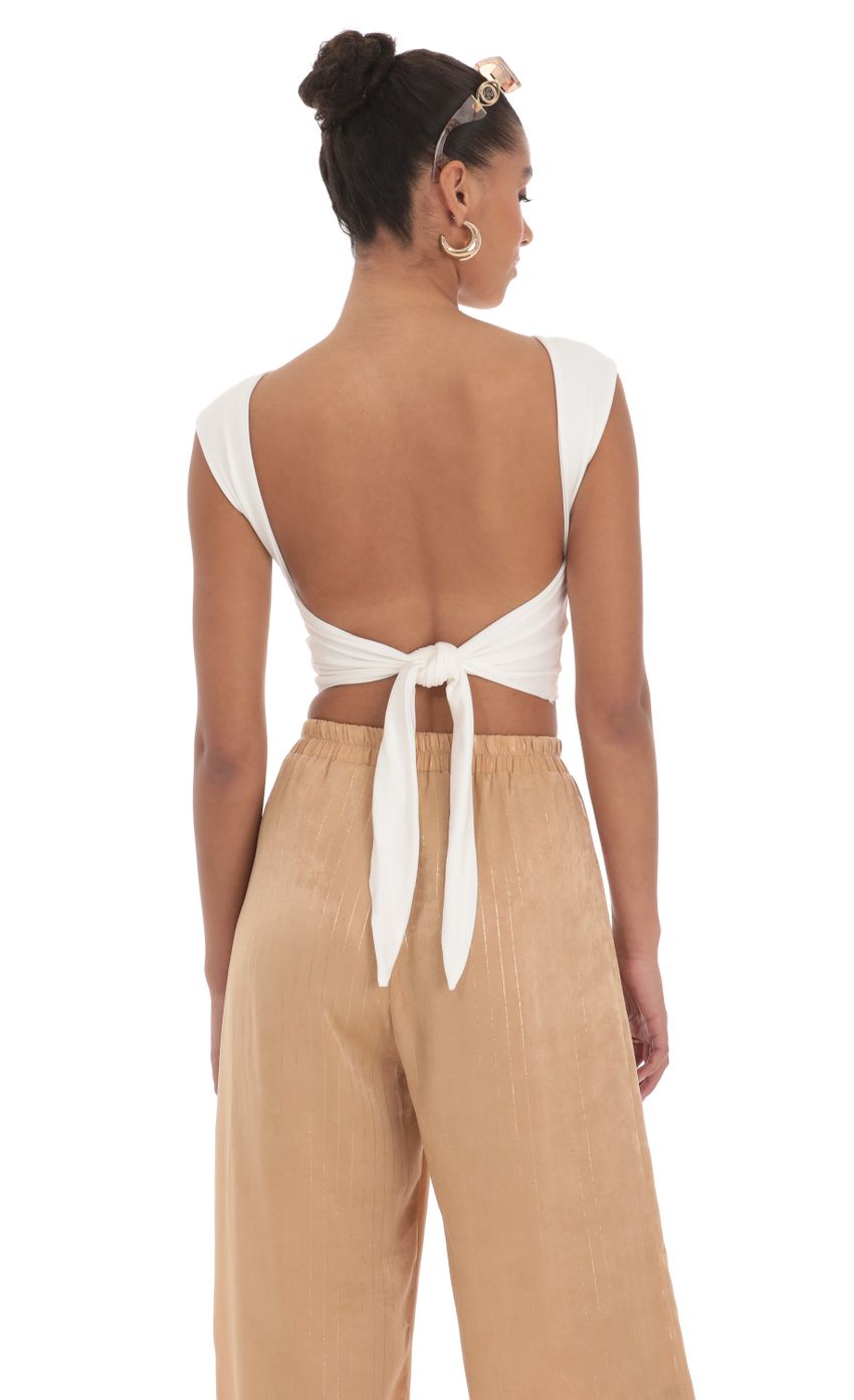 Picture Open Back Tie Top in White. Source: https://media-img.lucyinthesky.com/data/Mar24/850xAUTO/771897bb-89b1-47d7-8e71-d6a37ad197f7.jpg