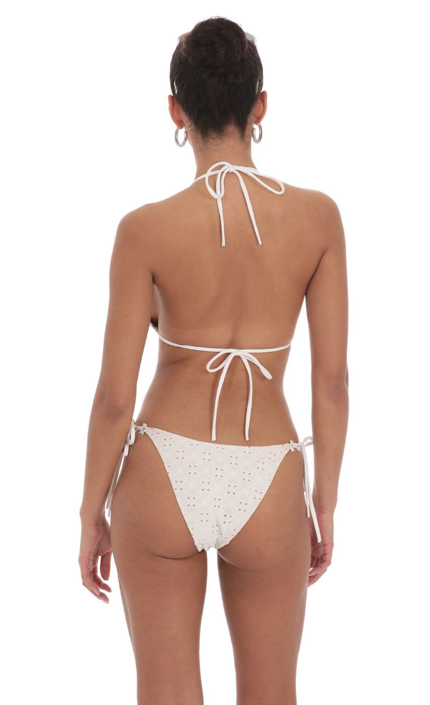 Picture Floral Eyelet Triangle Bikini Set in White. Source: https://media-img.lucyinthesky.com/data/Mar24/850xAUTO/7748053e-36ee-4256-af5a-2c084093020b.jpg