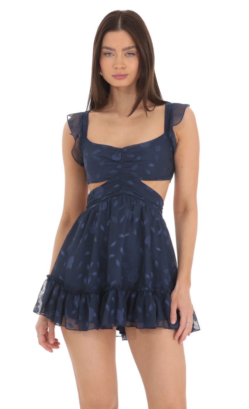 Picture Floral Ruffle Cutout Dress in Navy. Source: https://media-img.lucyinthesky.com/data/Mar24/850xAUTO/79b1898d-1c40-4229-a345-af1424362752.jpg