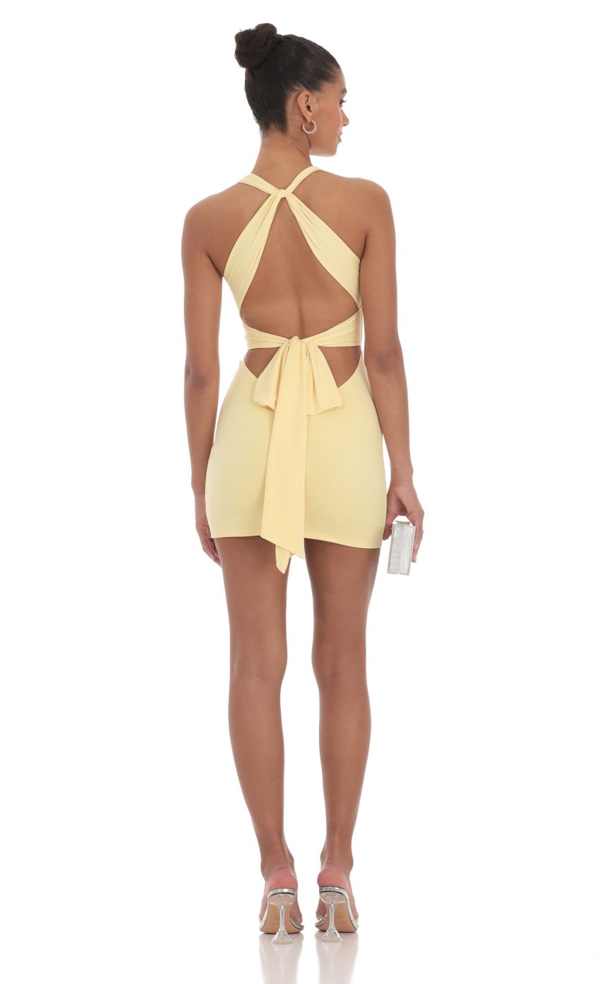 Picture Twist Open Back Dress in Yellow. Source: https://media-img.lucyinthesky.com/data/Mar24/850xAUTO/7a2eb1a3-2829-4211-952a-022dc7e49fb9.jpg