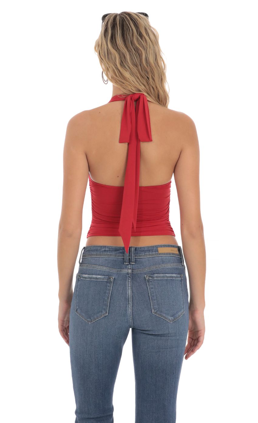 Picture Halter Ruched Top in Red. Source: https://media-img.lucyinthesky.com/data/Mar24/850xAUTO/7e5688e9-b38d-46a1-8b01-78b198244bd6.jpg
