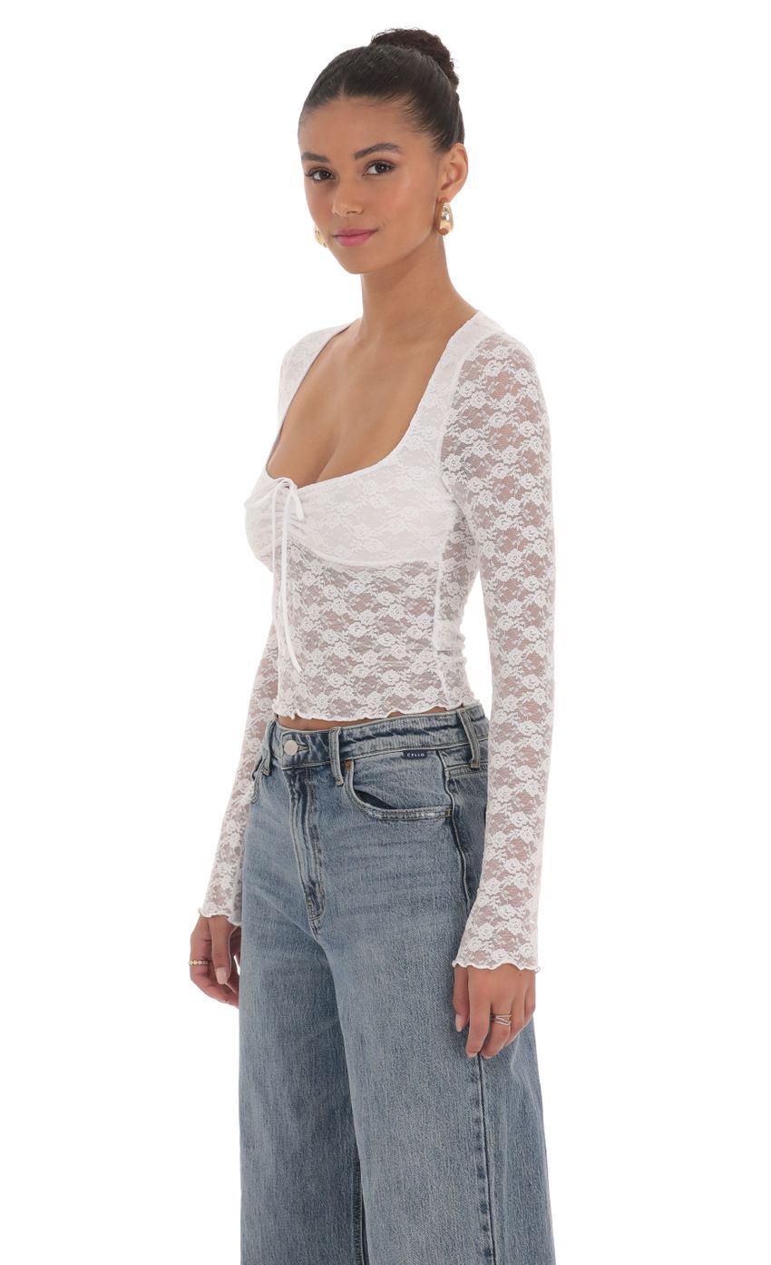 Picture Long Sleeve Lace Top in White. Source: https://media-img.lucyinthesky.com/data/Mar24/850xAUTO/7f654518-5d89-4c3c-b9cd-cd1697faf0bc.jpg