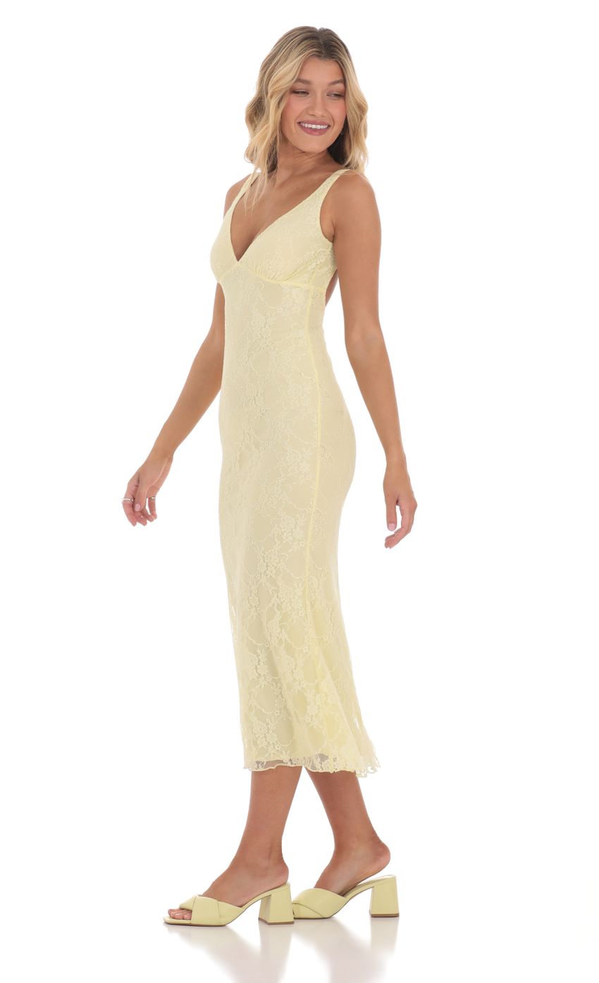 Picture Open Back Lace Midi Dress in Yellow. Source: https://media-img.lucyinthesky.com/data/Mar24/850xAUTO/860d8499-196e-437f-8554-91801b4acadb.jpg