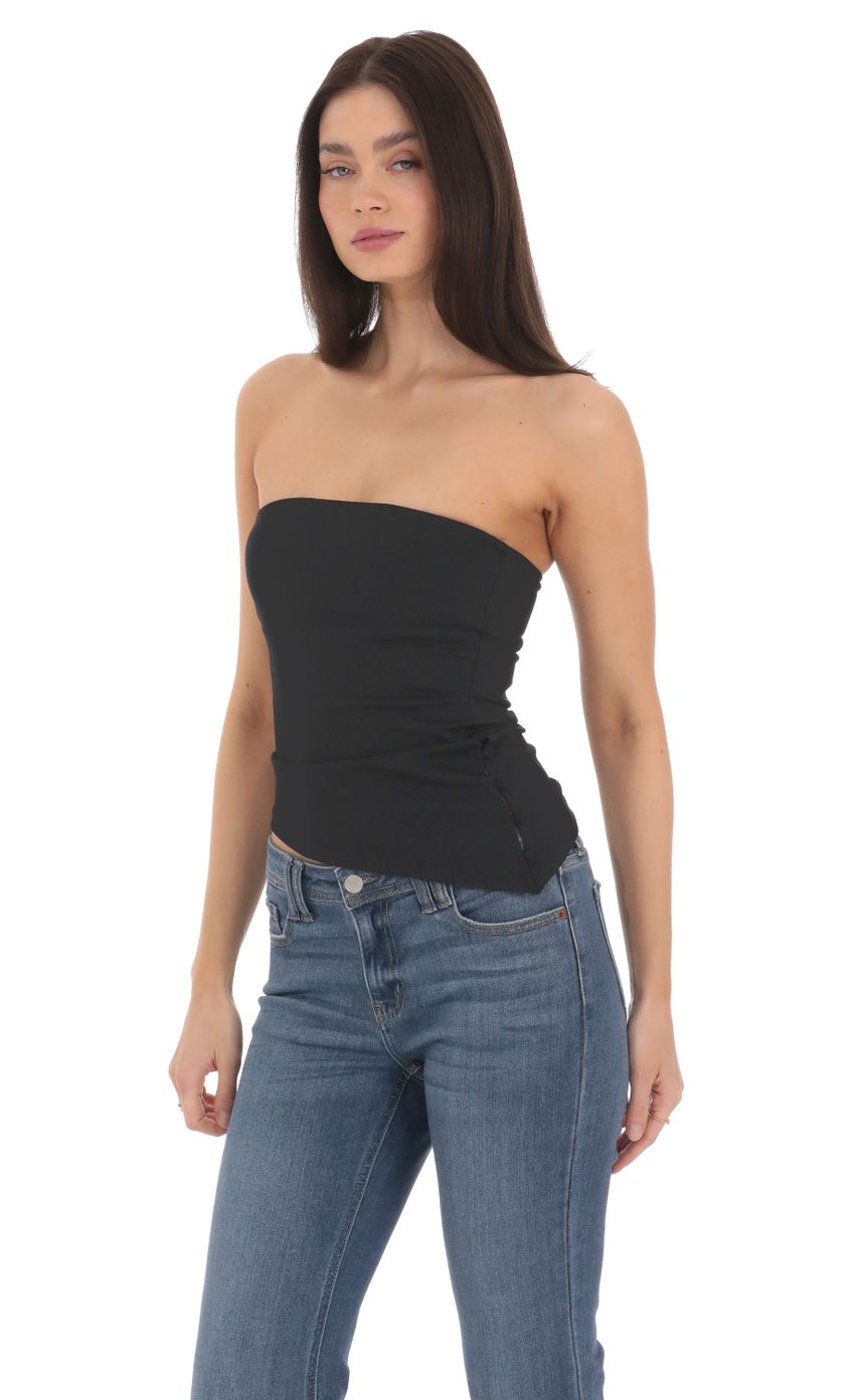 Picture Strapless Asymmetrical Top in Black. Source: https://media-img.lucyinthesky.com/data/Mar24/850xAUTO/8706a5a6-5080-4521-a4c6-56b14ff768e1.jpg
