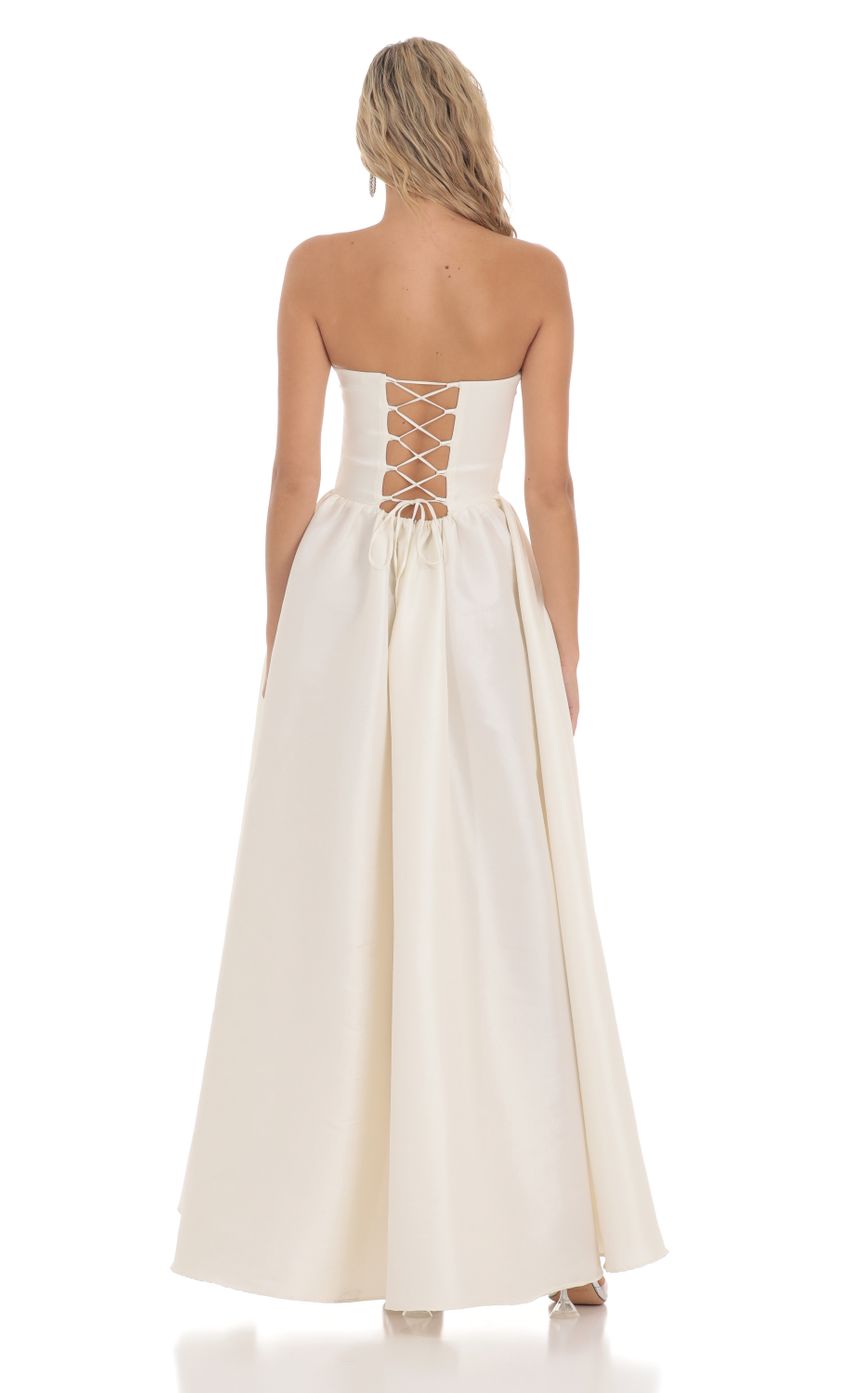 Picture Corset Strapless Gown Dress in White. Source: https://media-img.lucyinthesky.com/data/Mar24/850xAUTO/885be306-b2b1-4626-a6be-26f0d5f076a4.jpg