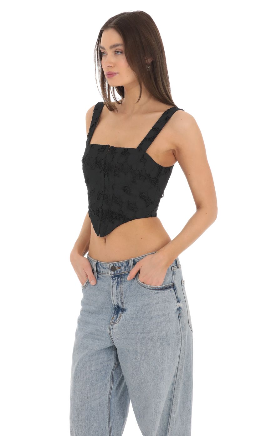 Picture Embroidered Floral Pointed Top in Black. Source: https://media-img.lucyinthesky.com/data/Mar24/850xAUTO/8ecfabda-2ee9-4822-b4a0-bbd9b343faac.jpg