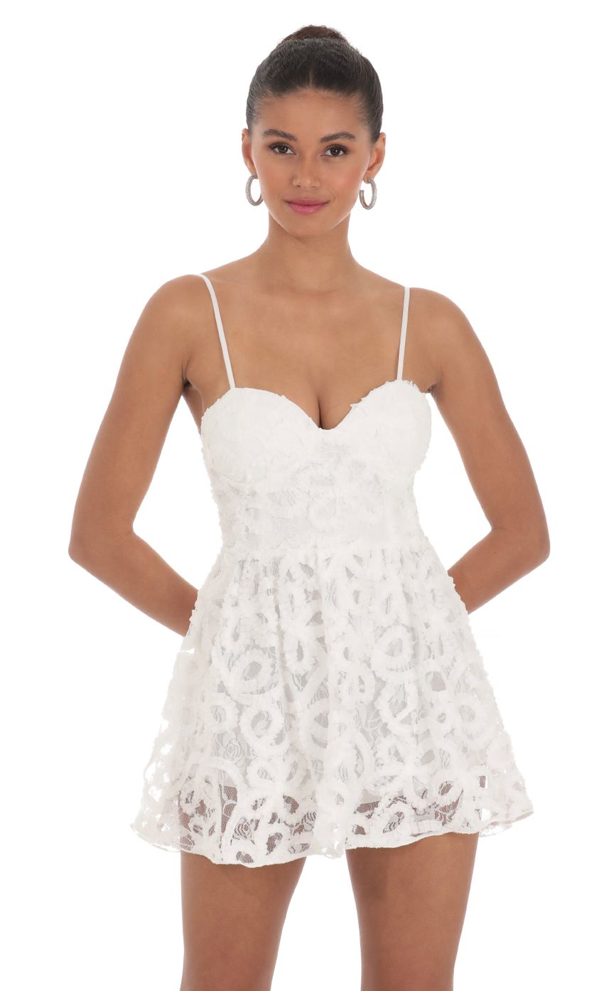 Picture Textured Swirl A-line Romper in White. Source: https://media-img.lucyinthesky.com/data/Mar24/850xAUTO/8fb6a0f7-c1e2-429f-bd26-768974793329.jpg