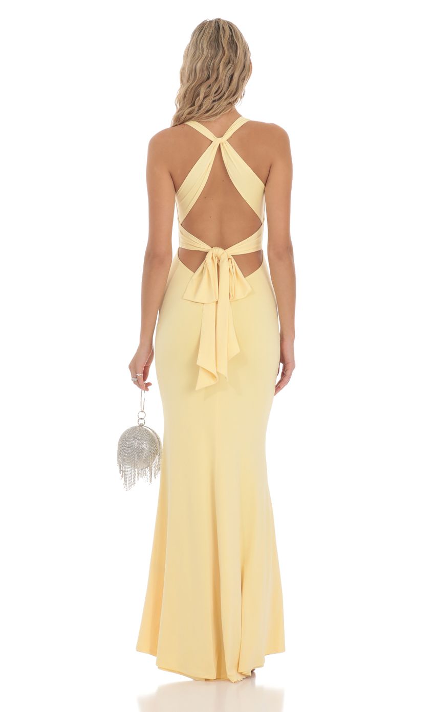 Picture Front Twist V-Neck Maxi Dress in Yellow. Source: https://media-img.lucyinthesky.com/data/Mar24/850xAUTO/9059b48c-f21b-484f-a3d0-6795384638ab.jpg
