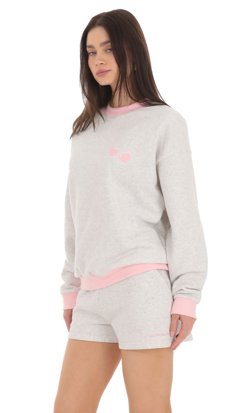 Picture Cherry Jumper in Heather Grey. Source: https://media-img.lucyinthesky.com/data/Mar24/850xAUTO/91fa0b82-e0e7-4093-83a9-13b3a1431f3d.jpg