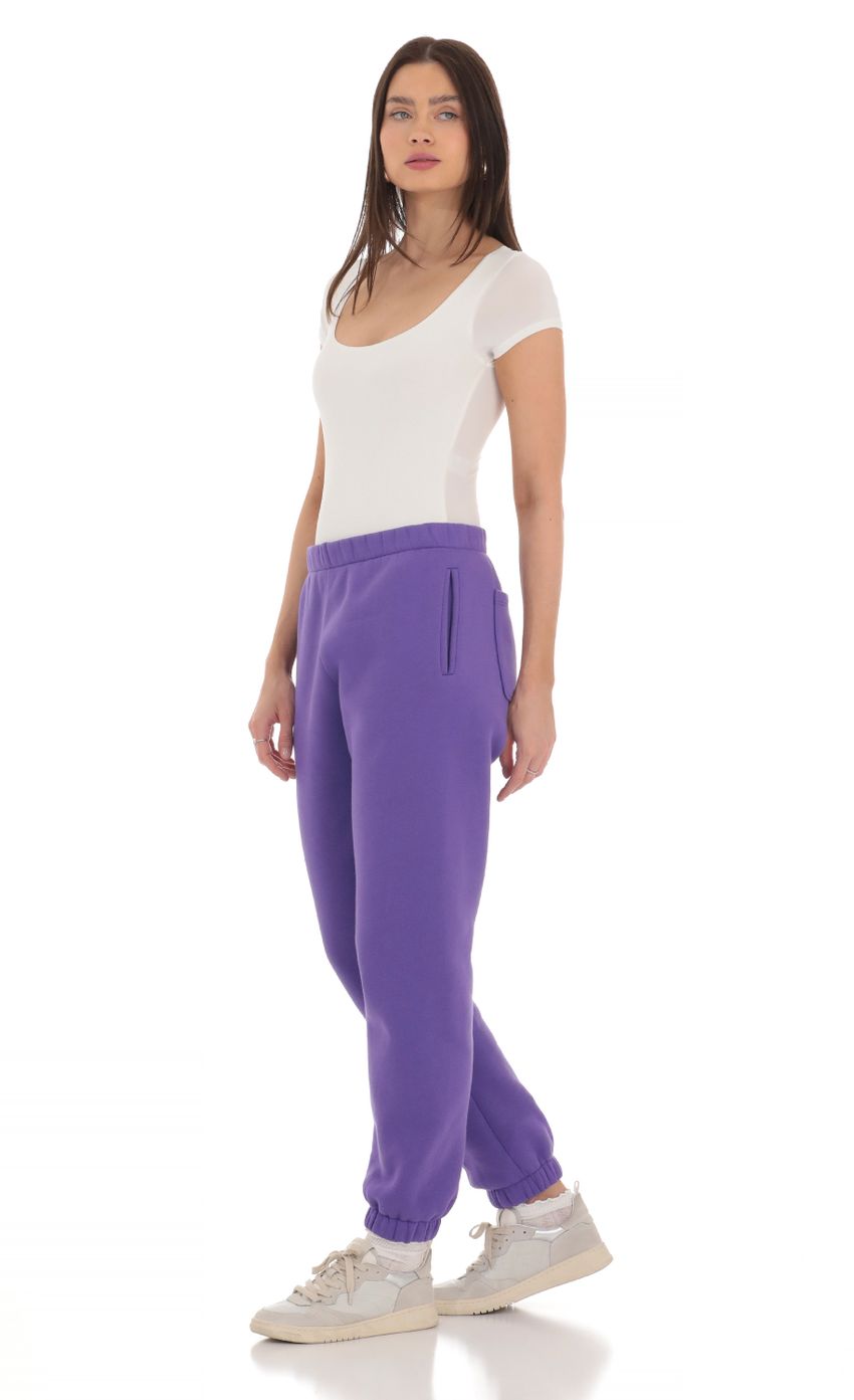 Picture Cinched Sweatpants in Purple. Source: https://media-img.lucyinthesky.com/data/Mar24/850xAUTO/97fe7d6b-a986-49e1-8808-9b20a3baa1f5.jpg