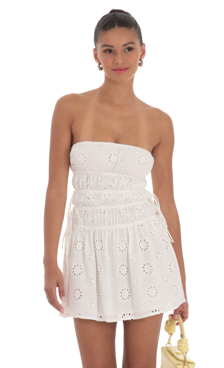 Picture Strapless Eyelet Dress in White. Source: https://media-img.lucyinthesky.com/data/Mar24/850xAUTO/9a0a8899-0f27-4319-80cb-15626073c22c.jpg