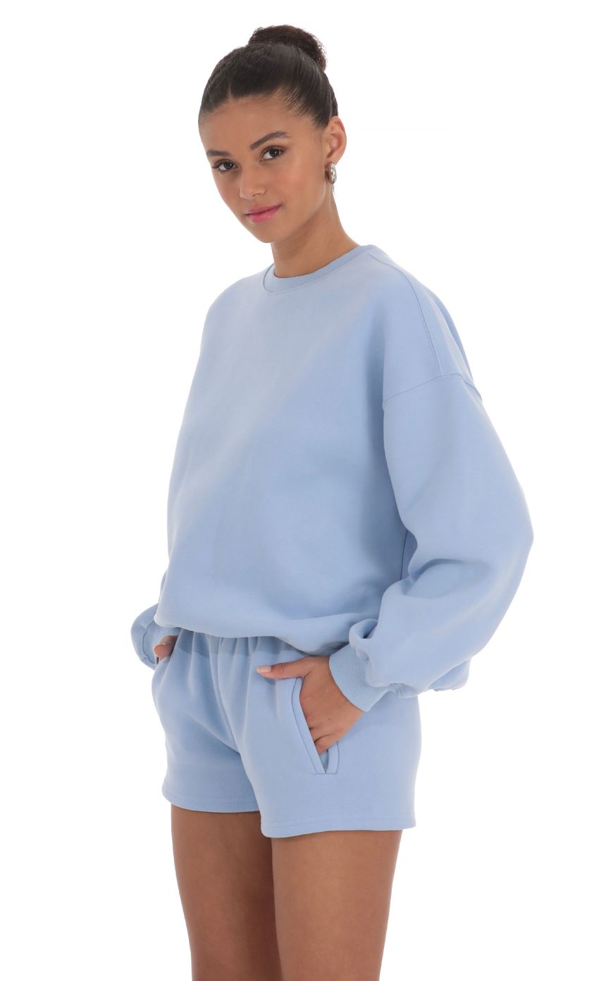 Picture Fleece Sweat Shorts in Baby Blue. Source: https://media-img.lucyinthesky.com/data/Mar24/850xAUTO/9d62d3a5-793b-46cd-ab81-6c63d61f6bcd.jpg