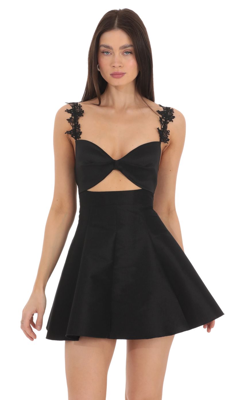 Picture Front Bow Cutout Flare Dress in Black. Source: https://media-img.lucyinthesky.com/data/Mar24/850xAUTO/9f072298-6194-4d10-928f-abc88b0abd34.jpg