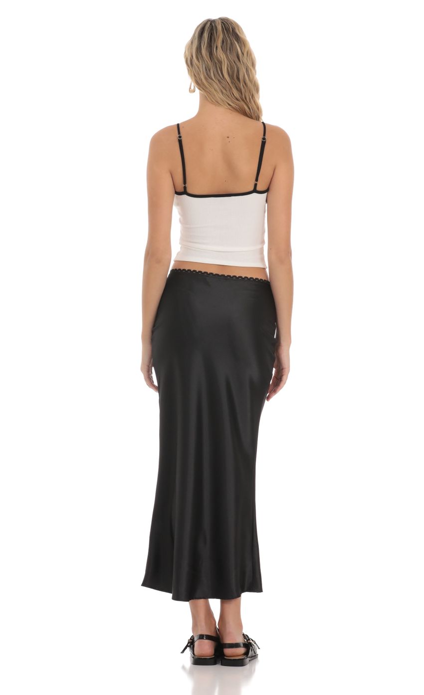 Picture Satin Maxi Skirt in Black. Source: https://media-img.lucyinthesky.com/data/Mar24/850xAUTO/a1267bad-1415-471a-8221-4f4420c1ad40.jpg