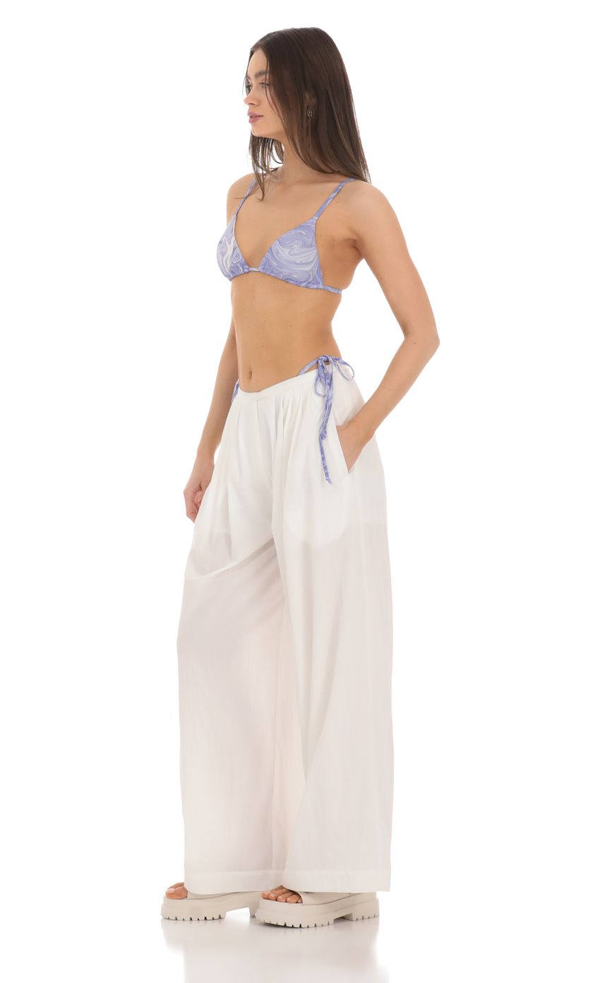 Picture Wide Leg Pants in White. Source: https://media-img.lucyinthesky.com/data/Mar24/850xAUTO/a46a614f-29b0-4c1e-9410-2af1d57c4f5e.jpg