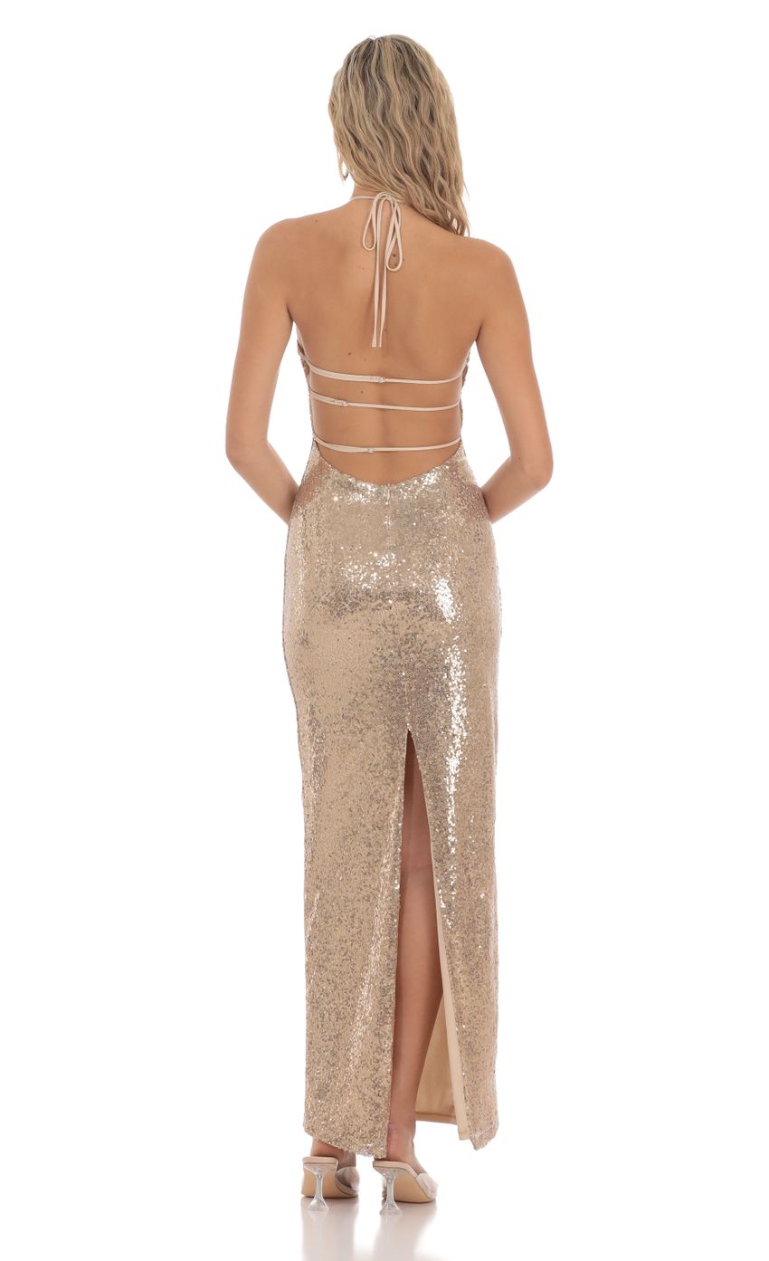 Picture Sequin Halter Maxi Dress in Gold. Source: https://media-img.lucyinthesky.com/data/Mar24/850xAUTO/abe39623-0872-4114-a7d8-5359e0c94ad6.jpg