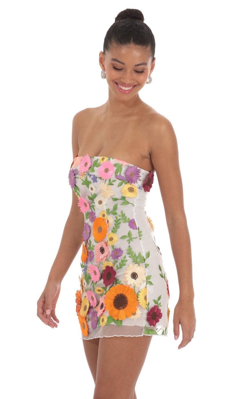 Picture 3-D Floral Strapless Dress in White. Source: https://media-img.lucyinthesky.com/data/Mar24/850xAUTO/adb1fcd9-b4d6-4e31-9f99-a74dbb614daa.jpg