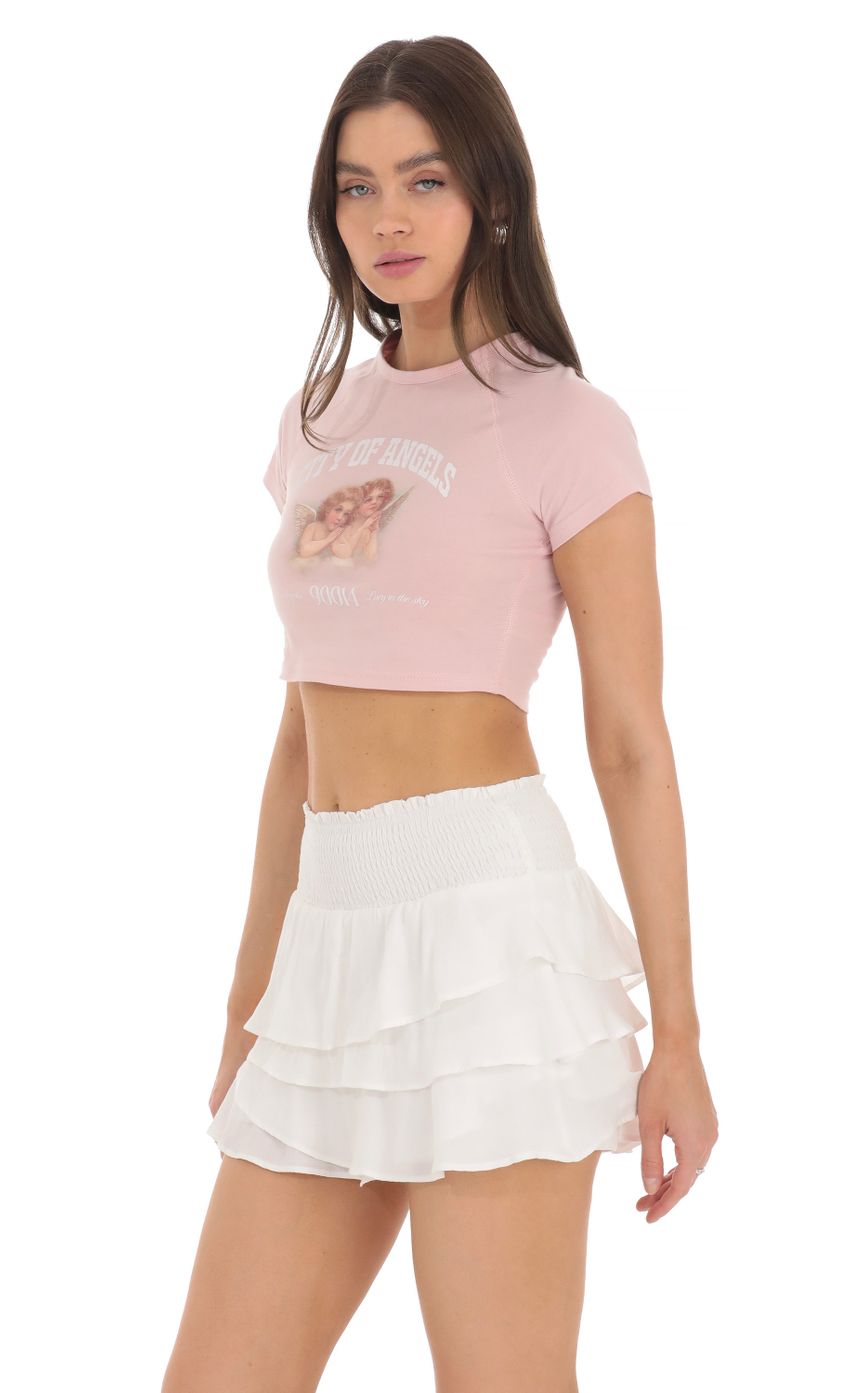 Picture High Waisted Ruffle Skort in White. Source: https://media-img.lucyinthesky.com/data/Mar24/850xAUTO/aec1cc00-42d9-4c4a-9af0-121883d5a181.jpg