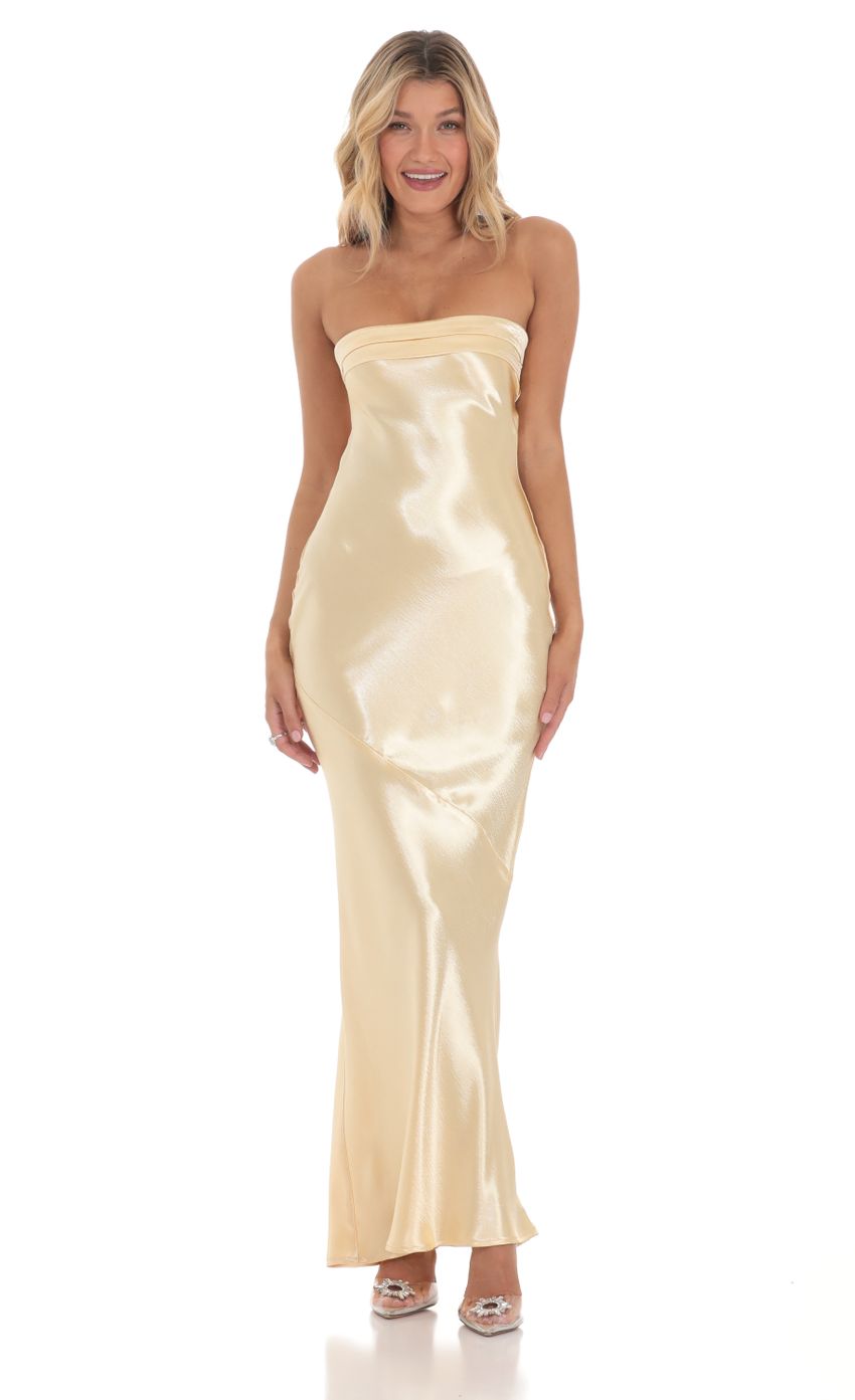 Picture Strapless Satin Open Back Maxi Dress in Gold. Source: https://media-img.lucyinthesky.com/data/Mar24/850xAUTO/b2876945-68d3-416c-bdbf-61ac2766a9c1.jpg