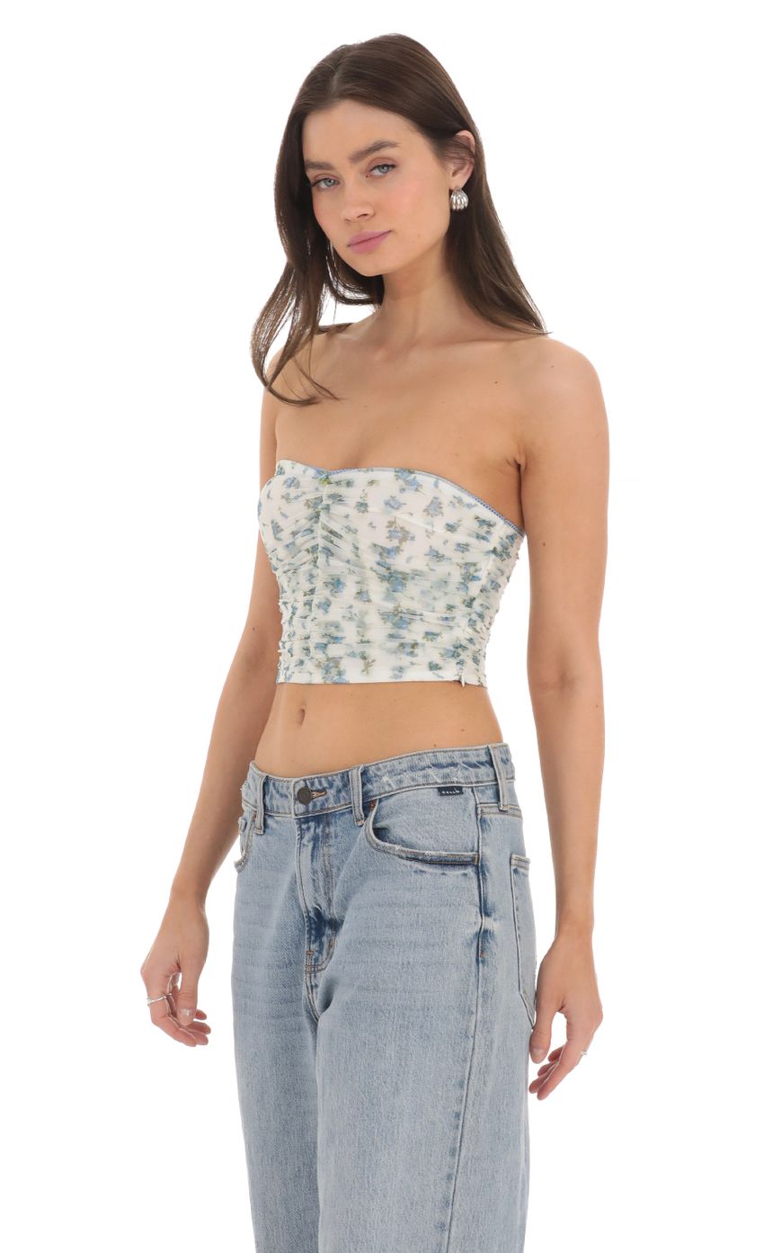 Picture Strapless Ruched Floral Top in White. Source: https://media-img.lucyinthesky.com/data/Mar24/850xAUTO/b3eced61-21c0-4c9a-bcc3-049b5f3bc108.jpg