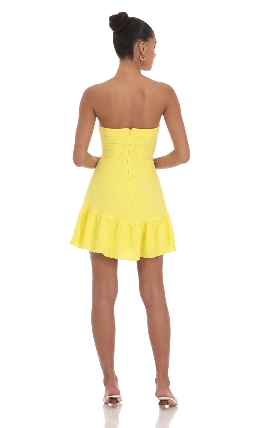 Picture Front Tie Strapless Corset Dress in Yellow. Source: https://media-img.lucyinthesky.com/data/Mar24/850xAUTO/b79e7df6-f0fa-4468-ac0b-fc67086db726.jpg