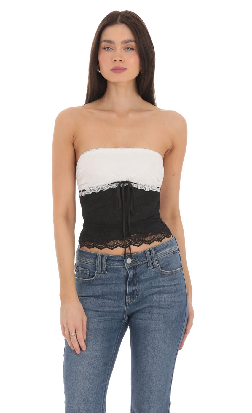 Picture Two Tone Lace Top in Black and White. Source: https://media-img.lucyinthesky.com/data/Mar24/850xAUTO/b7f1c9c8-95ed-4340-a52d-ea02d799b96a.jpg