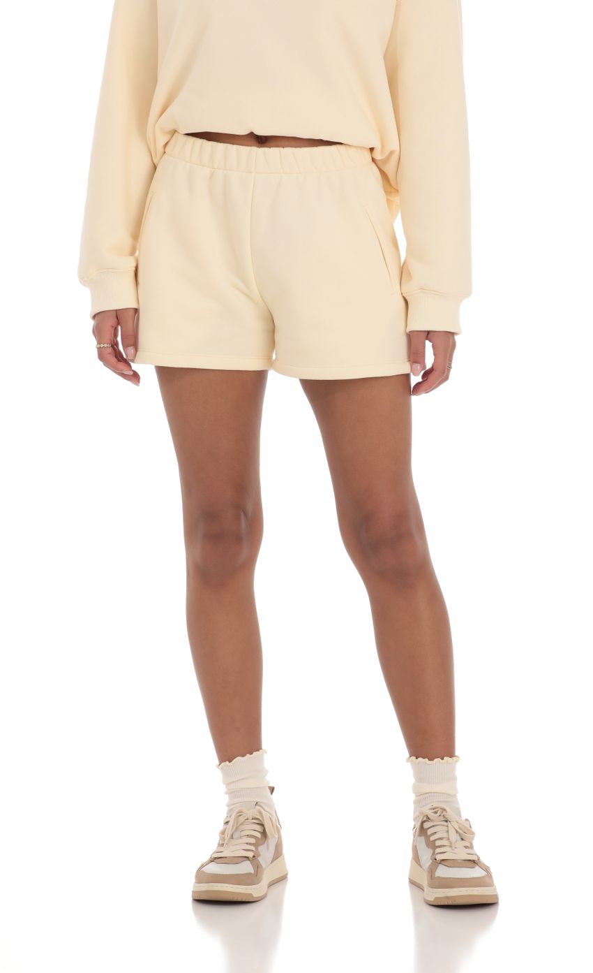 Picture Fleece Sweat Shorts in Cream. Source: https://media-img.lucyinthesky.com/data/Mar24/850xAUTO/c32649cf-9818-4eac-a560-a88cb1a25a96.jpg