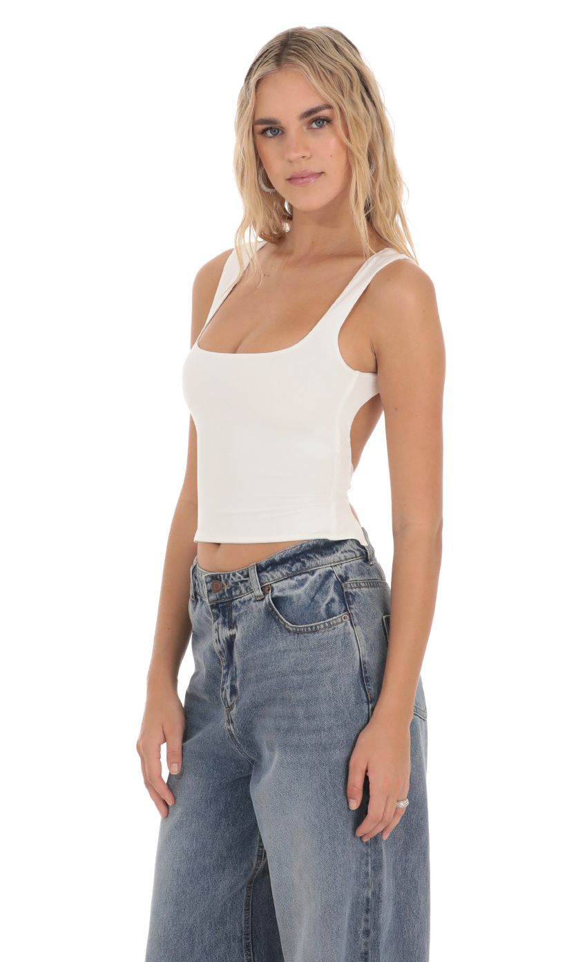 Picture Scoop Neck Open Back Top in White. Source: https://media-img.lucyinthesky.com/data/Mar24/850xAUTO/c45fc6e3-6939-4487-8658-ac35906ca7f3.jpg