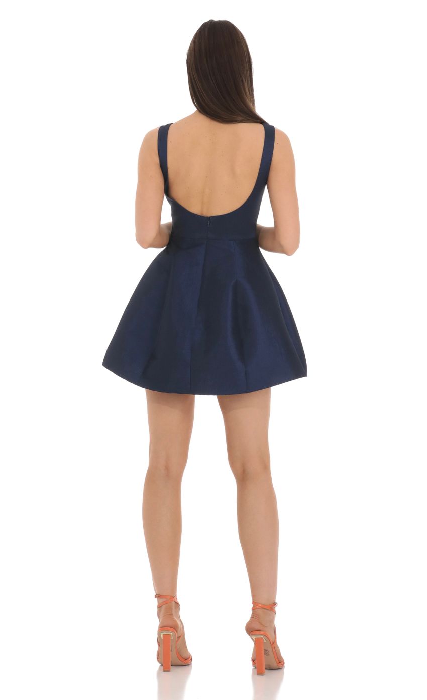 Picture High Neck Open Back Flare Dress in Navy. Source: https://media-img.lucyinthesky.com/data/Mar24/850xAUTO/c552ee55-548f-4891-b45d-e18d0a273ef0.jpg