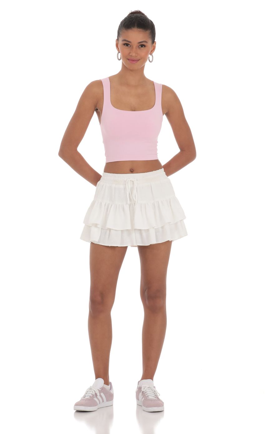 Picture Dotted Ruffle Skort in White. Source: https://media-img.lucyinthesky.com/data/Mar24/850xAUTO/c5834f2c-ef1e-46fd-bd74-8cd00cfa31b5.jpg
