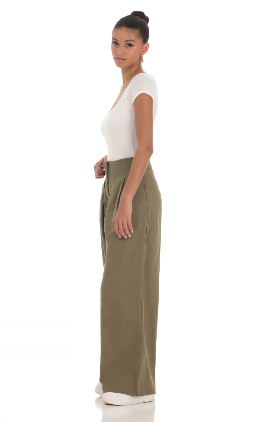 Picture Linen Pleated Pants in Olive. Source: https://media-img.lucyinthesky.com/data/Mar24/850xAUTO/c89c8e10-1975-4cb1-8387-03e6fce05813.jpg