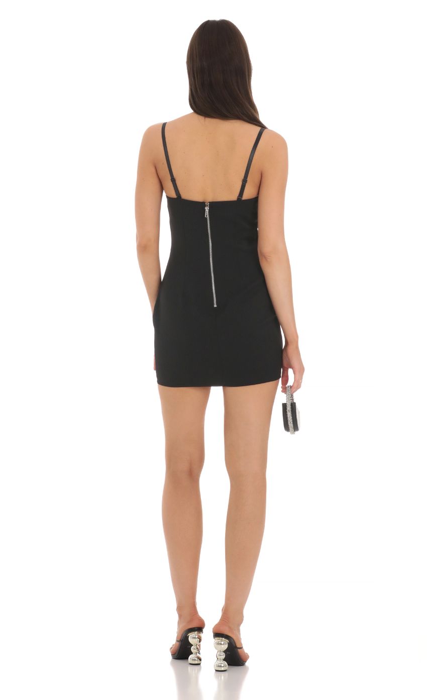 Picture Cutout Bodycon Dress in Black. Source: https://media-img.lucyinthesky.com/data/Mar24/850xAUTO/ce24fc26-1e67-4081-b769-30bbaeb1bcbd.jpg