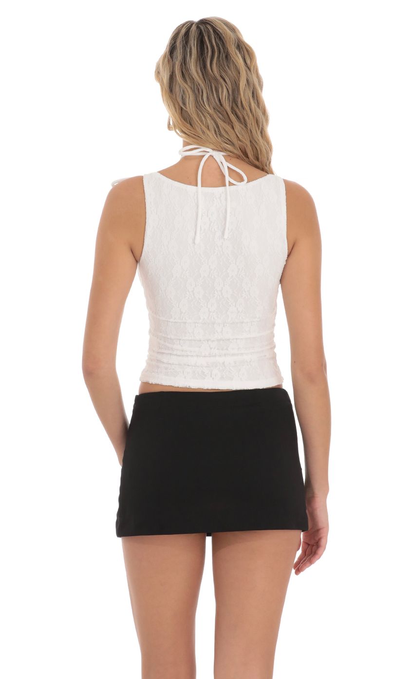 Picture Strappy Lace Top in White. Source: https://media-img.lucyinthesky.com/data/Mar24/850xAUTO/d39db4b5-c2af-43ed-912a-52ad637bbce0.jpg