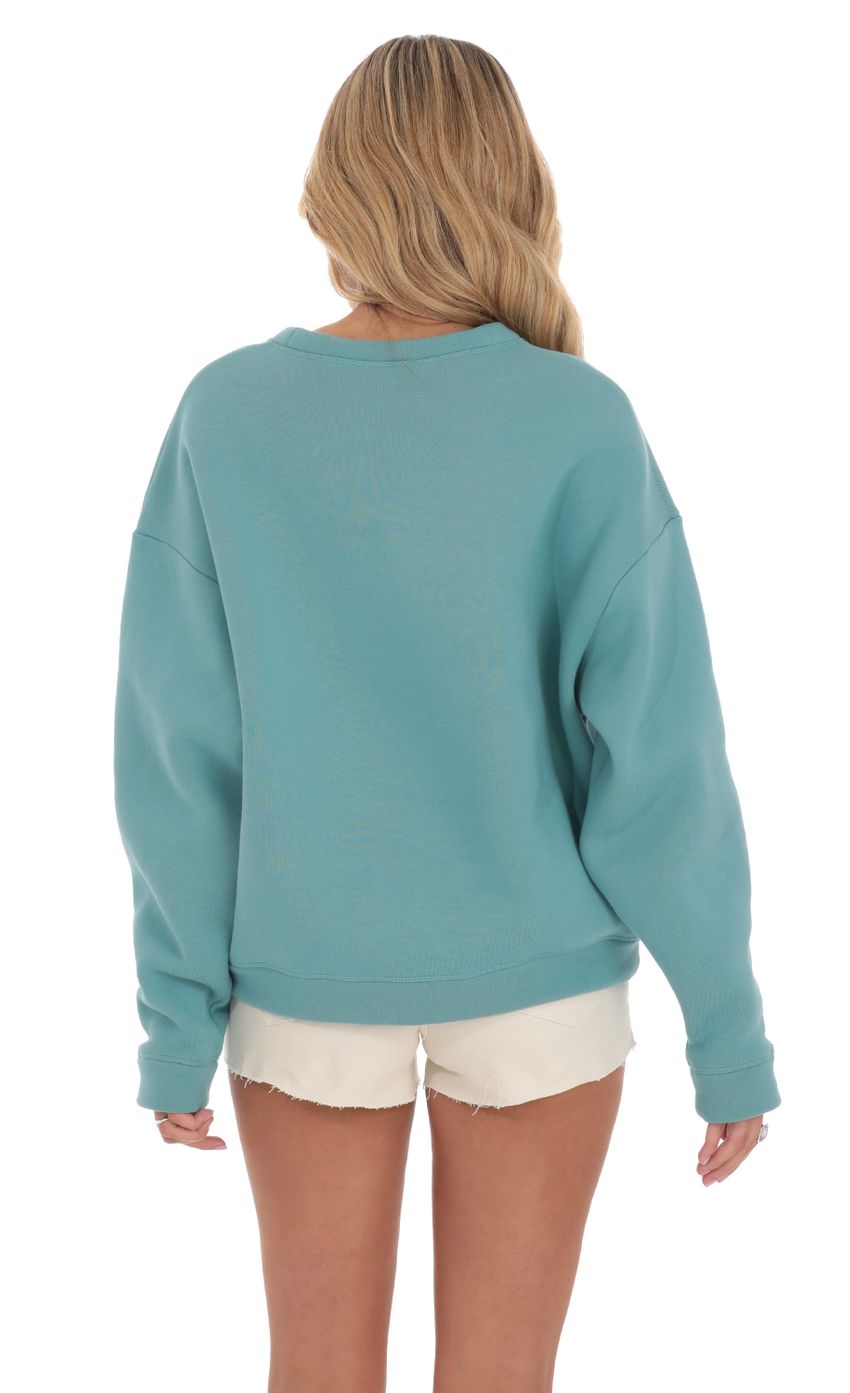 Picture Oversized Jumper in Seafoam Blue. Source: https://media-img.lucyinthesky.com/data/Mar24/850xAUTO/d3d85276-67bc-4713-8a92-b85d9d4a4749.jpg