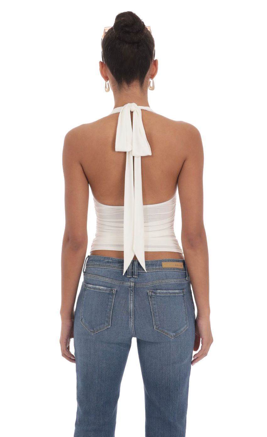 Picture Halter Ruched Top in White. Source: https://media-img.lucyinthesky.com/data/Mar24/850xAUTO/d5e1a44d-4830-4dd3-bad1-dd7bef49d4de.jpg