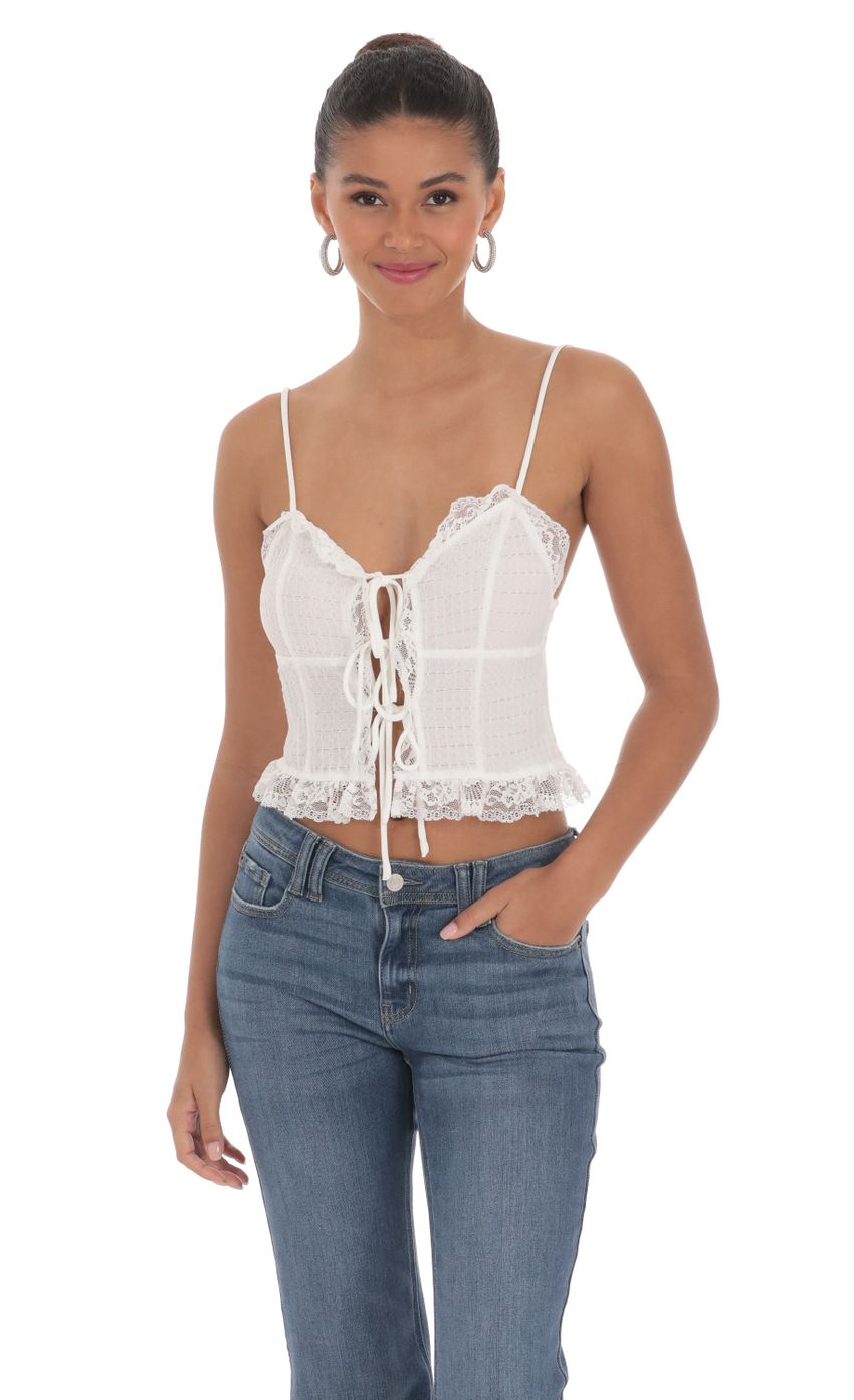 Picture Triple Tie Lace Top in White. Source: https://media-img.lucyinthesky.com/data/Mar24/850xAUTO/df6cd08f-ab63-4618-b03a-d7c5c83c4d4d.jpg