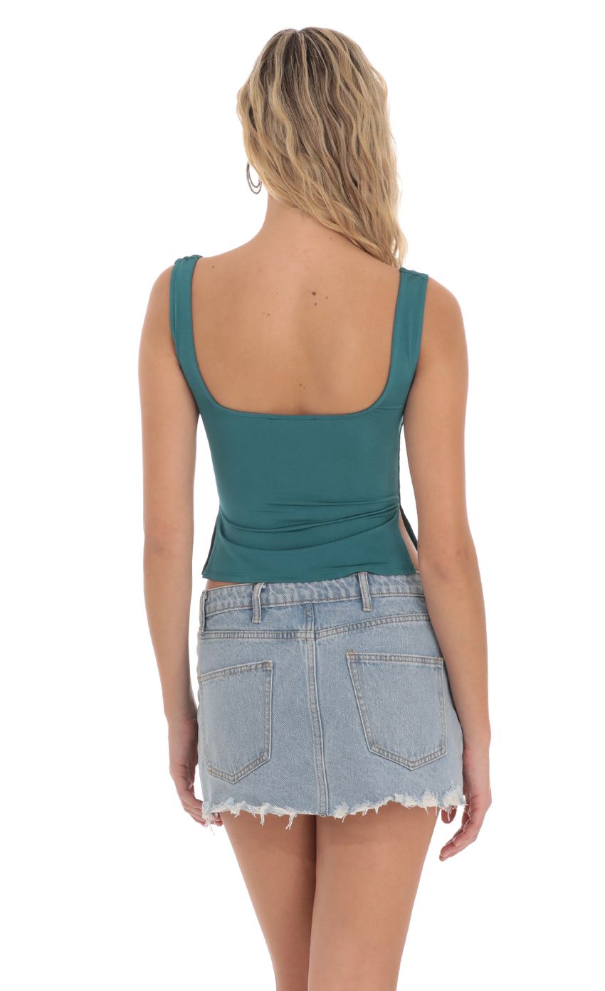 Picture Side Slit Top in Teal. Source: https://media-img.lucyinthesky.com/data/Mar24/850xAUTO/e666fa60-9f89-4e18-bfb4-adacb97c3a12.jpg