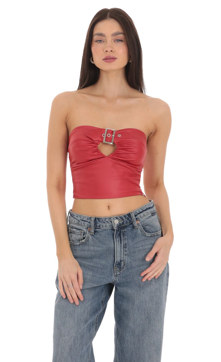 Picture Faux Leather Buckle Top in Red. Source: https://media-img.lucyinthesky.com/data/Mar24/850xAUTO/e71625aa-e35b-425f-883c-3f2a3b31d856.jpg