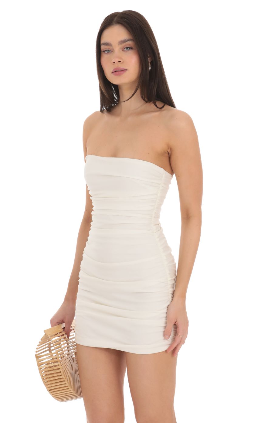 Picture Strapless Ruched Bodycon Dress in Ivory. Source: https://media-img.lucyinthesky.com/data/Mar24/850xAUTO/ea7ec84d-5d7d-4688-911c-3d6a9cd8e88f.jpg