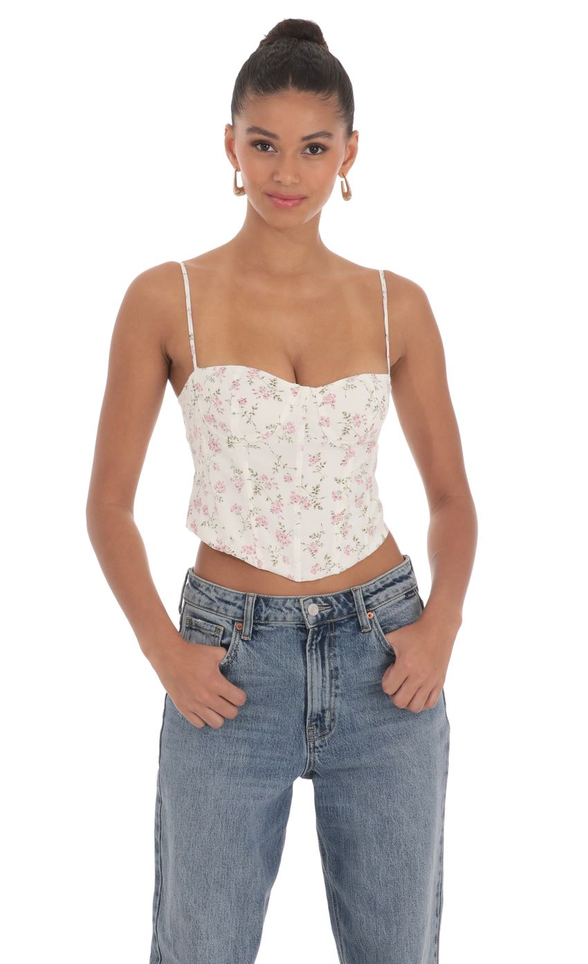 Picture Floral Corset Top in White. Source: https://media-img.lucyinthesky.com/data/Mar24/850xAUTO/ead4f171-07a5-46bb-b509-b286ed80676e.jpg