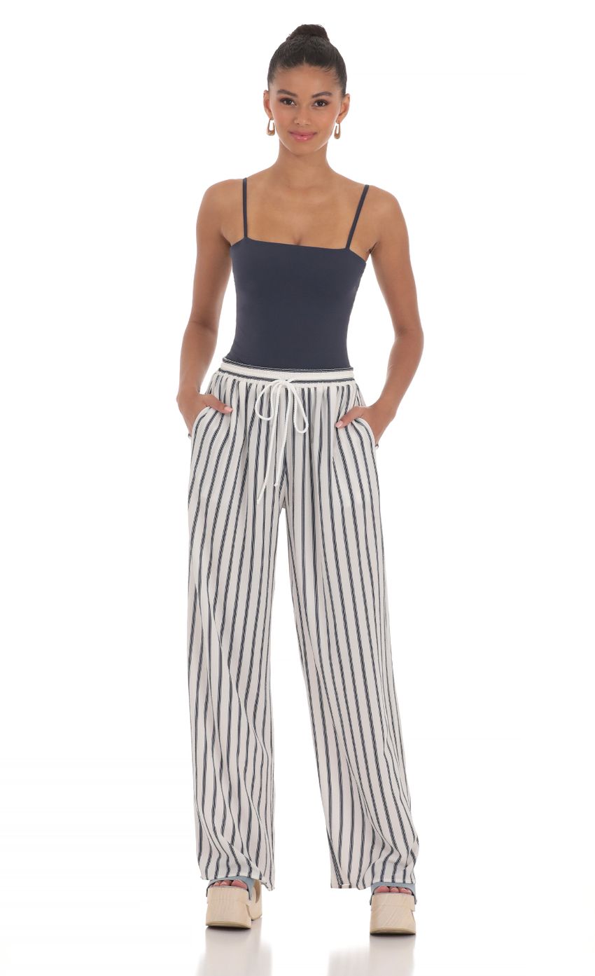 Picture Wide Leg Striped Pants in White and Navy. Source: https://media-img.lucyinthesky.com/data/Mar24/850xAUTO/f000d3fb-df1a-498f-a228-9de8afd33bed.jpg