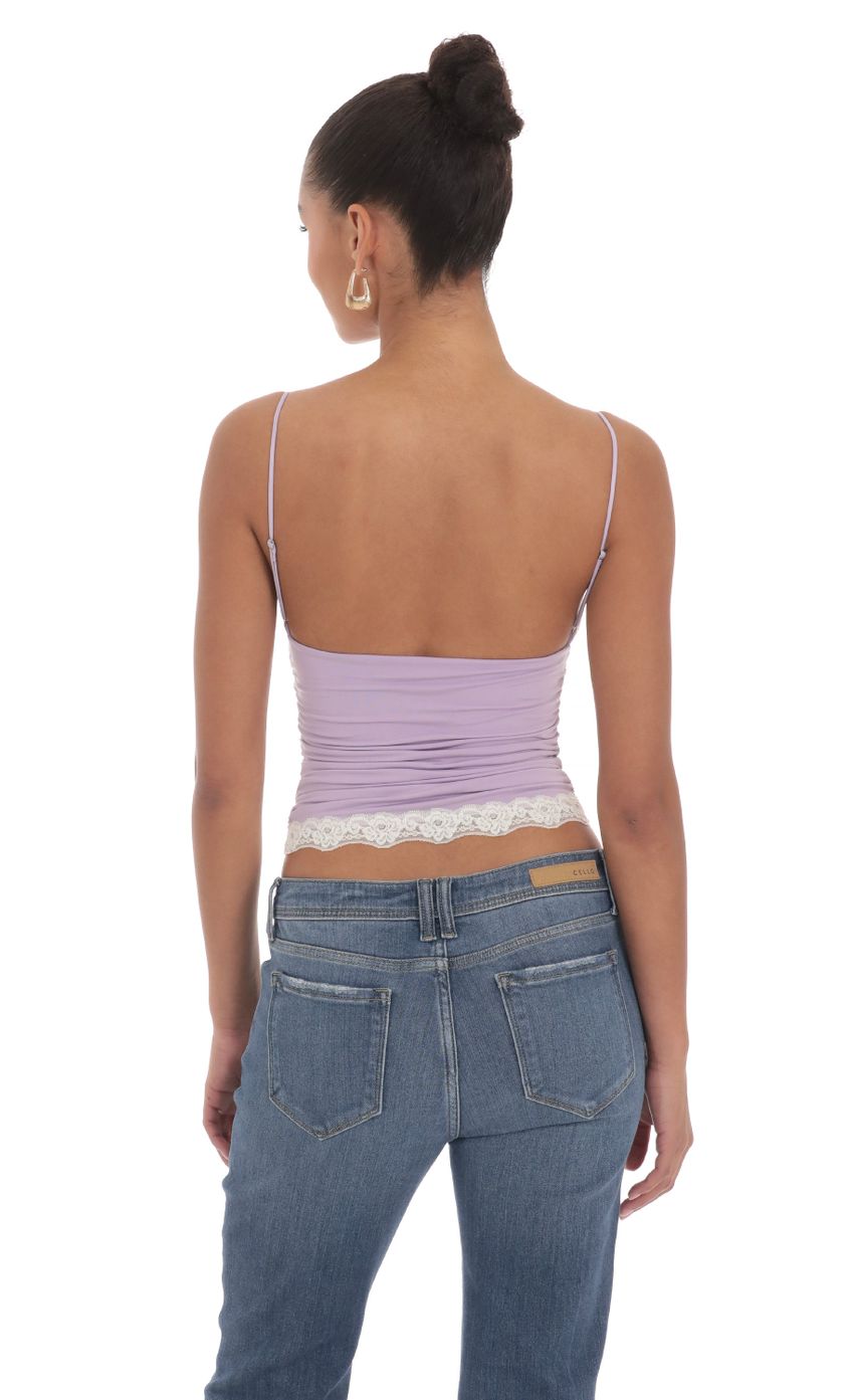 Picture Lace Ruched Top in Lavender. Source: https://media-img.lucyinthesky.com/data/Mar24/850xAUTO/f19b09ac-7852-4712-8dc9-43787ed9856f.jpg