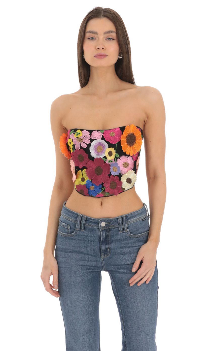 Picture 3-D Flower Strapless Top in Black. Source: https://media-img.lucyinthesky.com/data/Mar24/850xAUTO/f3833af0-c31c-4d20-8f1d-00757ed842dc.jpg