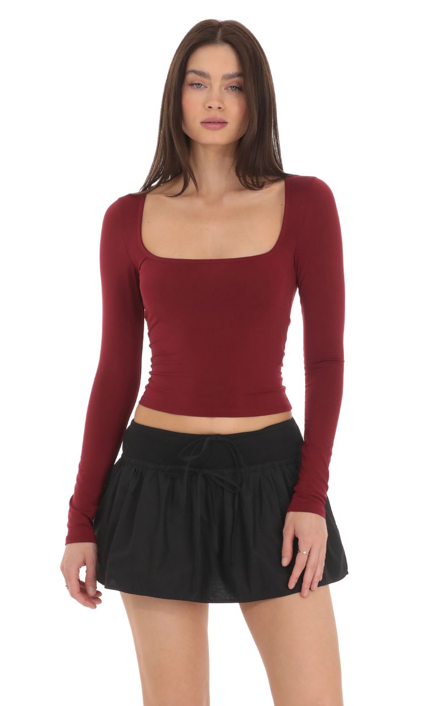 Picture Scoop Neck Long Sleeve Top in Maroon. Source: https://media-img.lucyinthesky.com/data/Mar24/850xAUTO/f3f26d79-1e22-43d5-ada8-becd11494135.jpg
