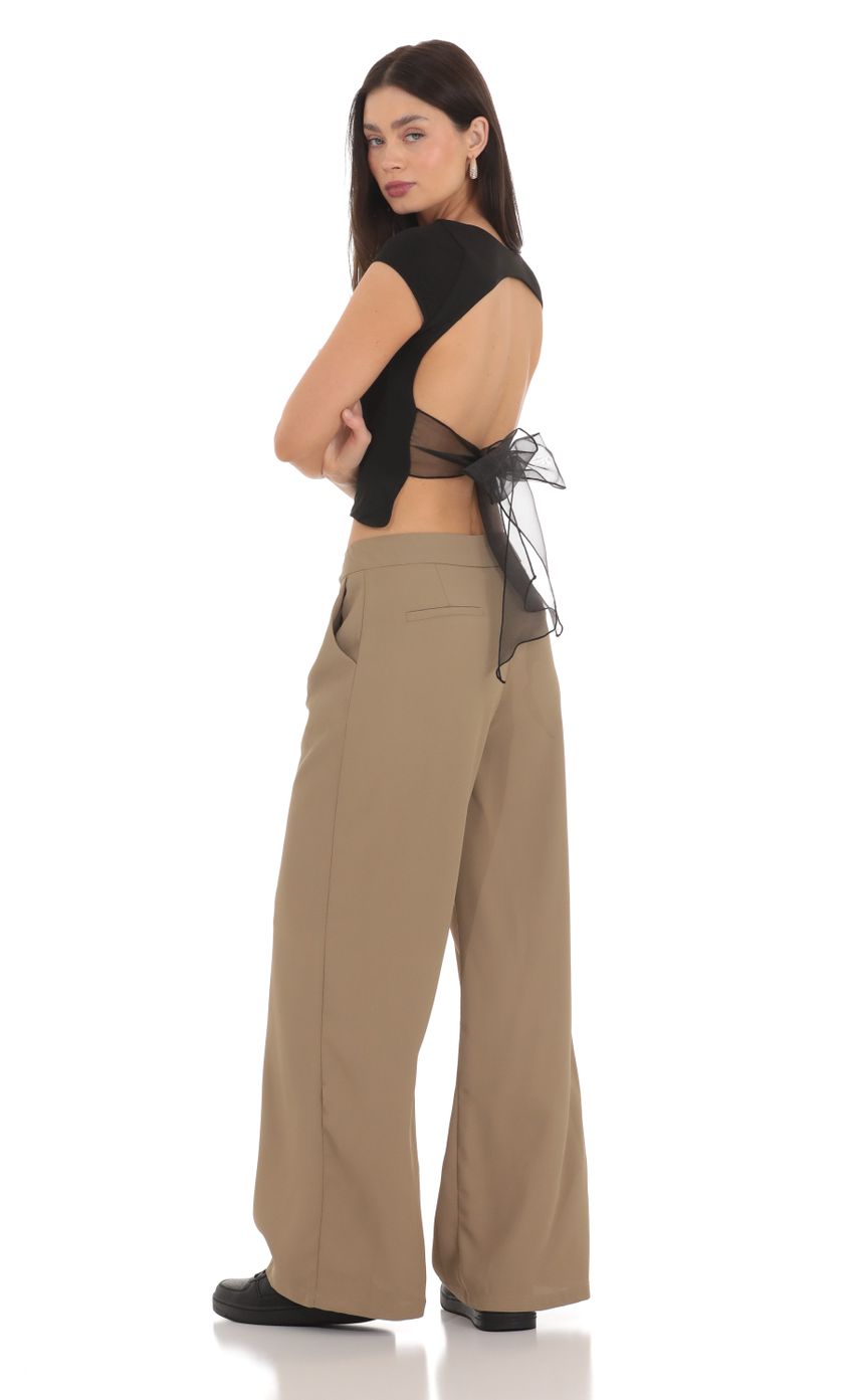 Picture Pleated Wide Leg Trousers in Taupe. Source: https://media-img.lucyinthesky.com/data/Mar24/850xAUTO/f5edaba0-9ecc-4f2f-9a94-01118ea16c8a.jpg