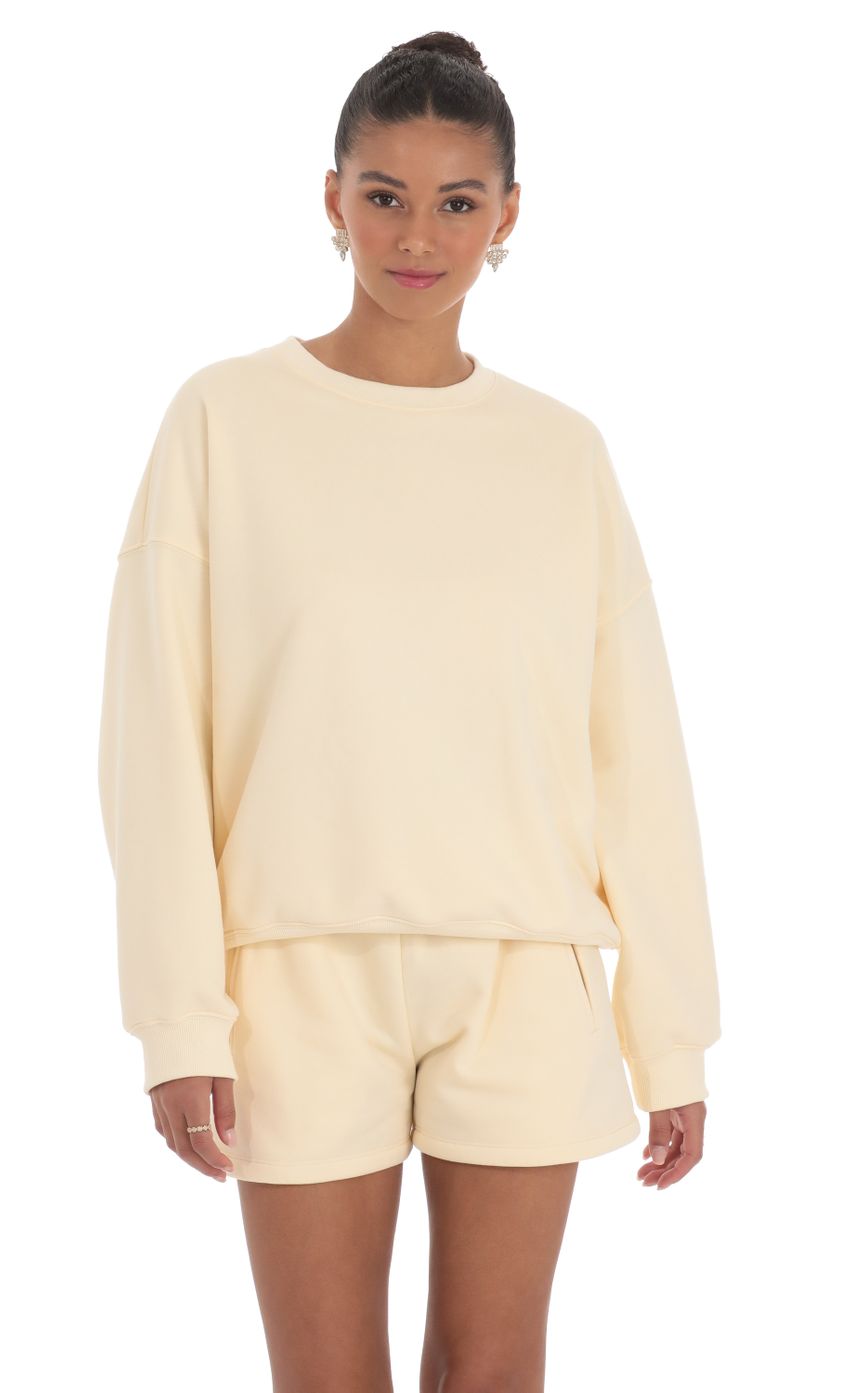 Picture Fleece Oversized Jumper in Cream. Source: https://media-img.lucyinthesky.com/data/Mar24/850xAUTO/f669977d-a4a0-4fed-911f-117572acb440.jpg