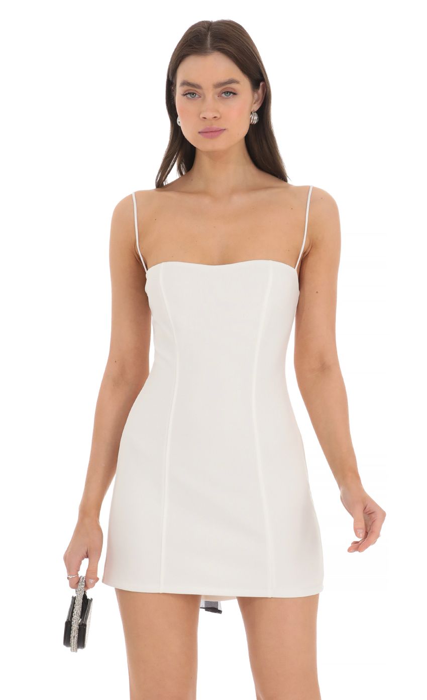 Picture Black Back Bow Bodycon Dress in White. Source: https://media-img.lucyinthesky.com/data/Mar24/850xAUTO/f6a6c7e7-66aa-4c5b-b110-a7508618bf68.jpg