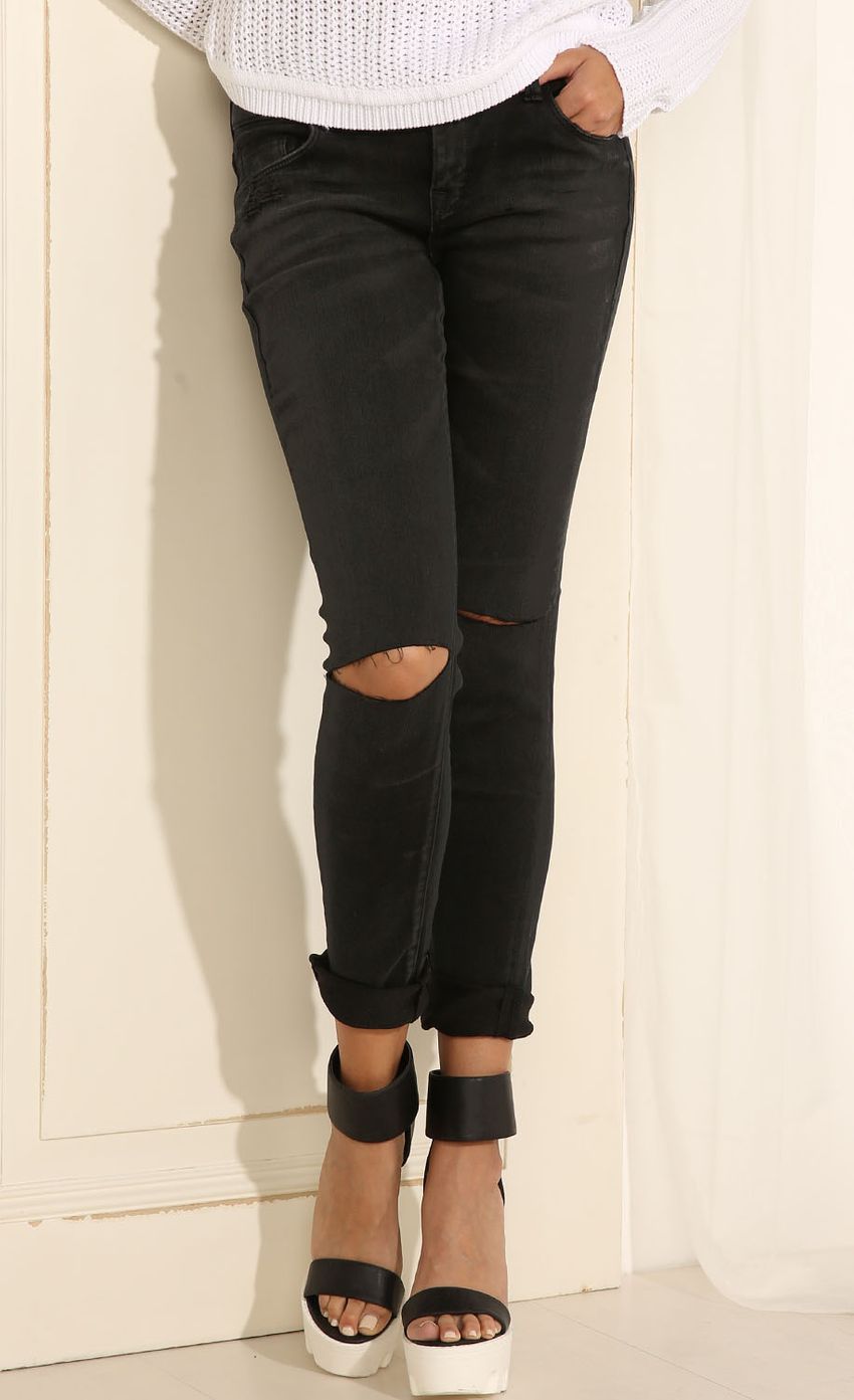 Picture Classic Ripped Knee Skinny Jeans In Black. Source: https://media-img.lucyinthesky.com/data/May15_1/850xAUTO/0Y5A1244.JPG