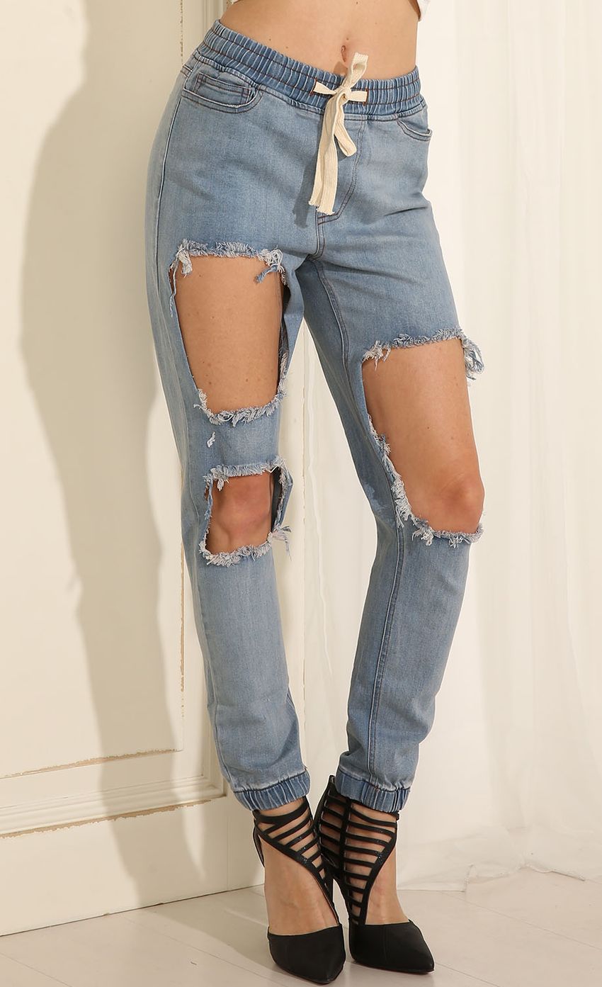 Picture Highly Distressed Drawstring Jeans. Source: https://media-img.lucyinthesky.com/data/May15_1/850xAUTO/0Y5A6514.JPG